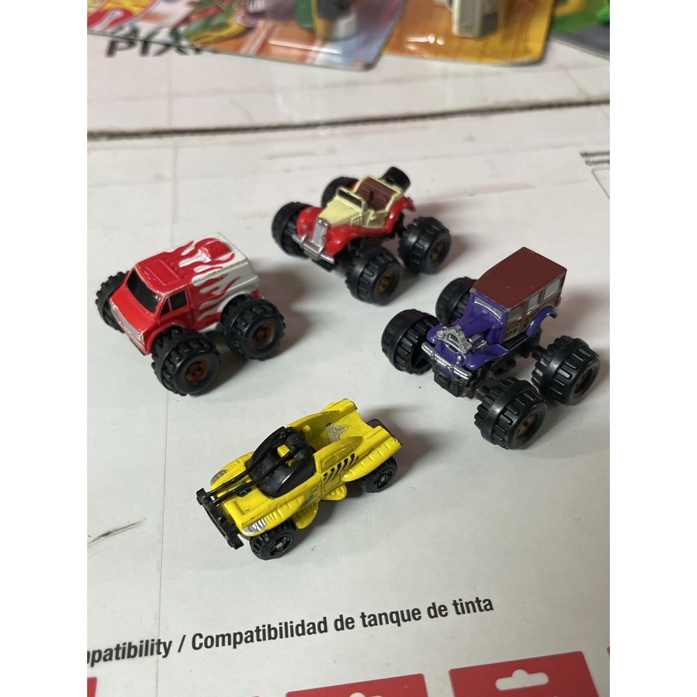 Lot of 4 Vintage Micro Machines Monster Trucks Off-Road Mini Vehicles